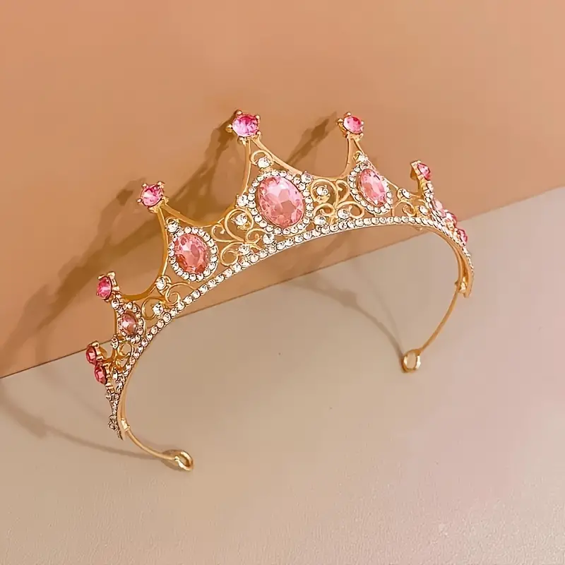 Zlatá korunka s růžovým diamantem