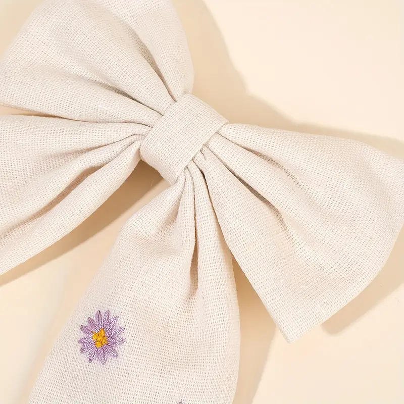 Sponka do vlasů s mašlí – krémová s vyšívanými fialovými kvítky