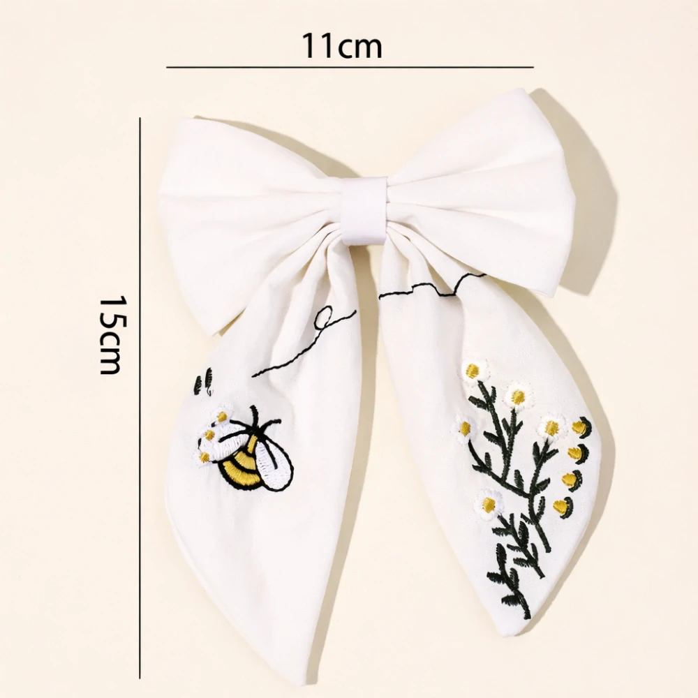 Sponka do vlasů s mašlí – bílá s výšivkou včelky