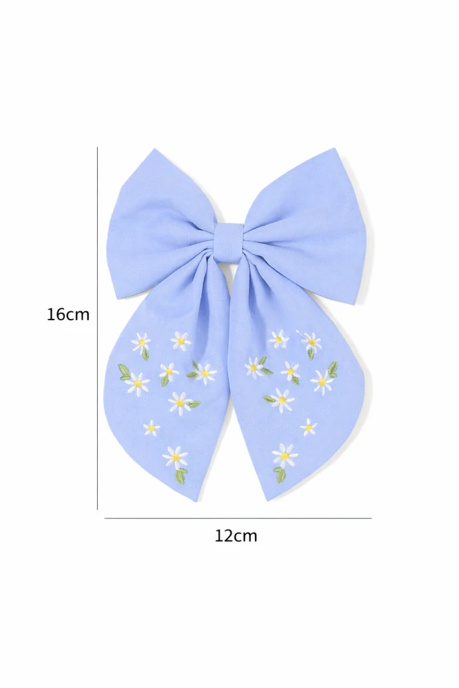 Modrá látková mašle do vlasů s květinovou výšivkou